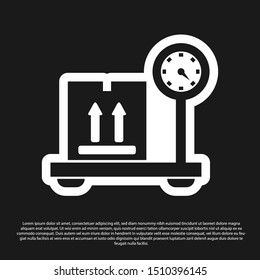 Black Scale with cardboard box icon isolated on black background. Logistic and delivery. Weight of delivery package on a scale.  Vector Illustration