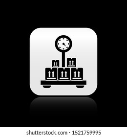 Black Scale with cardboard box icon isolated on black background. Logistic and delivery. Weight of delivery package on a scale. Silver square button. Vector Illustration