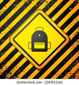 Black School backpack icon isolated on yellow background. Warning sign. Vector