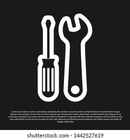 Black Screwdriver and wrench tools icon isolated on black background. Service tool symbol.  Vector Illustration