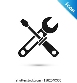 Black Screwdriver and wrench tools icon isolated on white background. Service tool symbol.  Vector Illustration