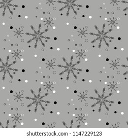 Black seamless Christmas pattern with different snowflakes falling