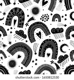 Black seamless pattern with magic rainbows, stars and clouds. Can be used in textile industry, paper, background, scrapbooking.