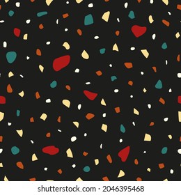 Black seamless pattern with nut crumb, mosaic and terrazzo texture. Can be used for decor, textiles, fabrics, background, packaging, wrapping paper, wallpaper, design, printing, banners, templates