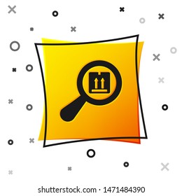 Black Search package icon isolated on white background. Parcel tracking symbol. Magnifying glass and cardboard box. Logistic and delivery. Yellow square button. Vector Illustration