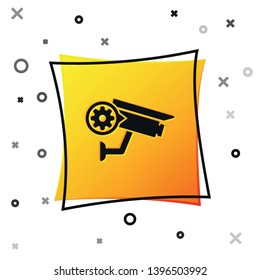 Black Security camera and gear icon isolated on white background. Adjusting app, service concept, setting options, maintenance, repair, fixing. Yellow square button. Vector Illustration