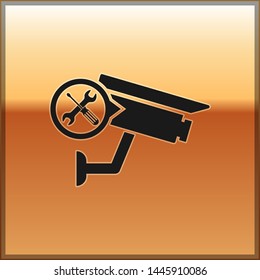 Black Security camera with screwdriver and wrench icon isolated on gold background. Adjusting, service, setting, maintenance, repair, fixing.  Vector Illustration