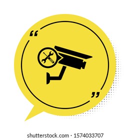 Black Security camera with screwdriver and wrench icon isolated on white background. Adjusting, service, setting, maintenance, repair, fixing. Yellow speech bubble symbol. Vector Illustration