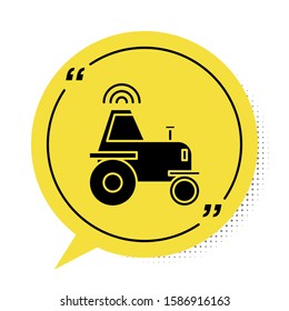 Black Self driving wireless tractor on a smart farm icon isolated on white background. Smart agriculture implement element. Yellow speech bubble symbol. Vector Illustration