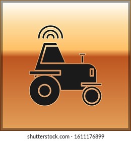Black Self driving wireless tractor on a smart farm icon isolated on gold background. Smart agriculture implement element.  Vector Illustration