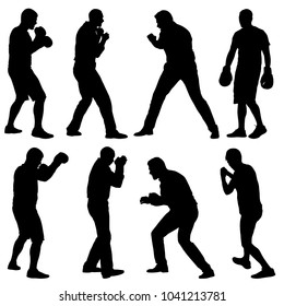 Black set silhouette of an athlete boxer on a white background.