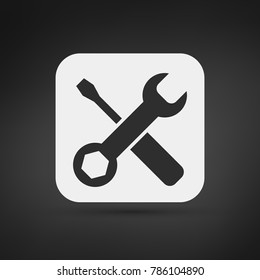 Black settings tools icon on light app background with shadow