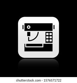 Black Sewing machine icon isolated on black background. Silver square button. Vector Illustration