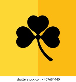 Black shamrock icon vector illustration. Yellow background