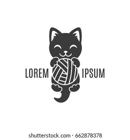 Black shape of kitten with ball in paws. Cat logo. Simple animal logotype for shop and vet clinic or handmade company