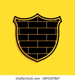 Black Shield with cyber security brick wall icon isolated on yellow background. Data protection symbol. Firewall logo. Network protection. Long shadow style. Vector.