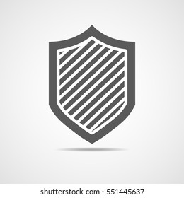 Black shield in flat design. Shield icon isolated. Vector illustration.
