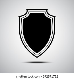 Black shield icon on grey background. Vector shield illustration