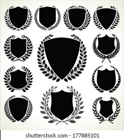 Black shield and laurel wreaths