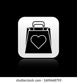 Black Shopping bag with heart icon isolated on black background. Shopping bag shop love like heart icon. Valentines day symbol. Silver square button. Vector Illustration