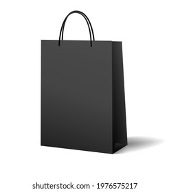 Black shopping bag (plastic or paper bag) isolated on white background. Blank mockup design useful for shop merchandise, delivery, selling