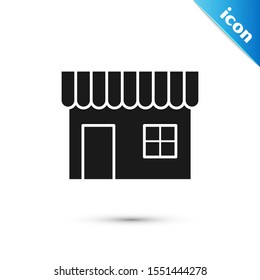 Black Shopping building or market store icon isolated on white background. Shop construction.  Vector Illustration