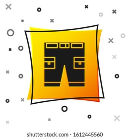 Black Short or pants icon isolated on white background. Yellow square button. Vector Illustration