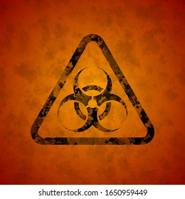 The black sign is a biological danger against a dirty orange background. The structure of the sign is damaged. Spots on the sign and in the background