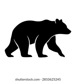 A black silhouette of a bear walking, emphasizing its shape and posture in a natural environment, suitable for wildlife and nature themes.