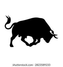 Black silhouette of a buffalo in mid-charge, capturing dynamic movement and strength, isolated on a plain background for dramatic effect.