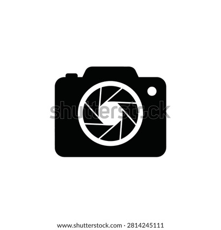 Black silhouette of a camera with a circular aperture shutter symbol in the center