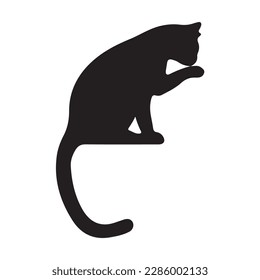 Black silhouette of cat sitting sideways isolated on white background. Vector illustration, icon, clip art 