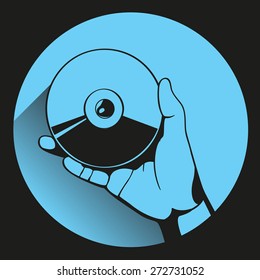 Black silhouette CD on Hand 
- web icon in circle frame. technology concept, flat and shadow theme design sign, vector art image illustration, isolated on blue background