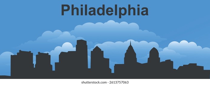 Black silhouette of the city of Philadelphia against a blue sky with clouds