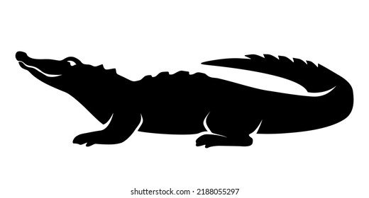 Black silhouette of a crocodile isolated on a white background. Vector illustration