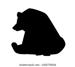 Black silhouette. Cute Brown bear. Carnivoran mammals, family Ursidae. Cartoon animal design. Flat vector illustration isolated on white background. Forest inhabitant. Wild animal with brown fur.