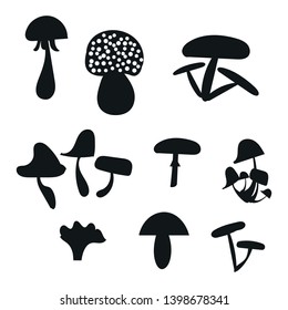 Black silhouette. Decorative mushrooms illustration. Vector illustration isolated on white background. 