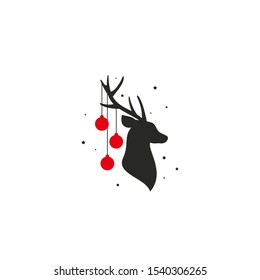 Black silhouette of deer head with antlers, red christmas tree toy balls on horns, snow and stars. vector flat icon isolated on white background. Christmas card