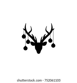 Black silhouette of deer head with antlers and with christmas tree toy balls on horns. vector flat icon isolated on white background. Christmas card
