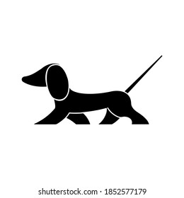 Black silhouette of a dog . Dachshund. Vector illustration