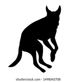 black silhouette of a dog jumping