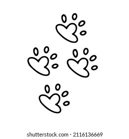 Black silhouette of a dog paw print. Animal paw prints in doodle style. Hand-drawn sketch. The footprint of a dog or cat. Pet footprint cute illustration.  Vector isolated on white background.
