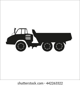 Black silhouette of a dump truck on a white background. Vector illustration