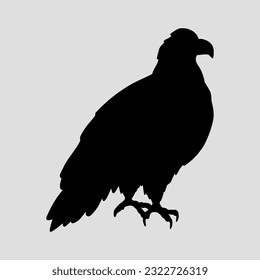 Black silhouette of an eagle. Vector icon on a gray background
