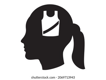 Black silhouette of the face of a woman or young man with the symbol of a basketball jersey .. Basketball player