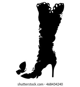 black silhouette of fancy boot