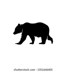 black silhouette in the form of a bear or a simple black bear.