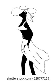The black silhouette of a girl on the beach