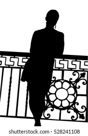 Black silhouette of a girl standing against a carved railing on a white background. Old entrance.