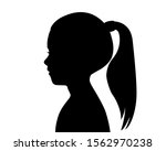 Black silhouette of a girl's head. Child profile. Long hair pulled in a ponytail. Female silhouette. Drawing isolated on a white background.  Vector stock illustration.